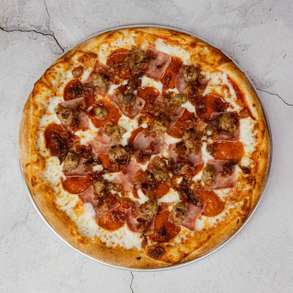 Indulge in Our Meat Pizza